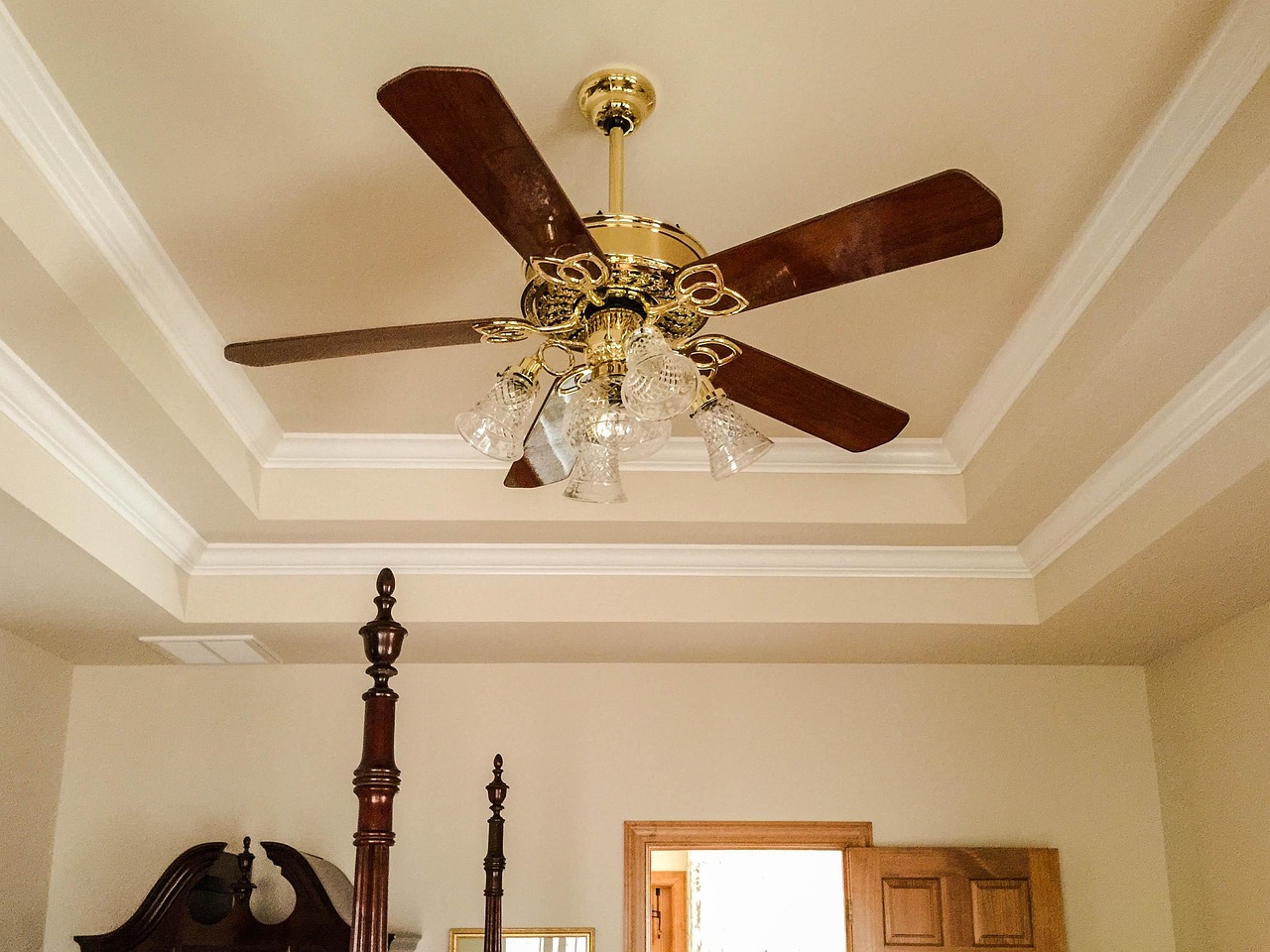 ceiling fan, tray ceiling, crown molding, light fixture, fan blades, cooling, electric fan, electric light, rotate, spin, circulate, hanging fan, glass globes, wooden blades, walnut blades, architectural trim, interior design, brown globe, ceiling fan, ceiling fan, ceiling fan, ceiling fan, ceiling fan, crown molding